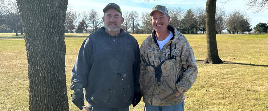 Shane Malek and Bill Paulus in a Field