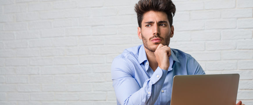 Confused Man on a Computer